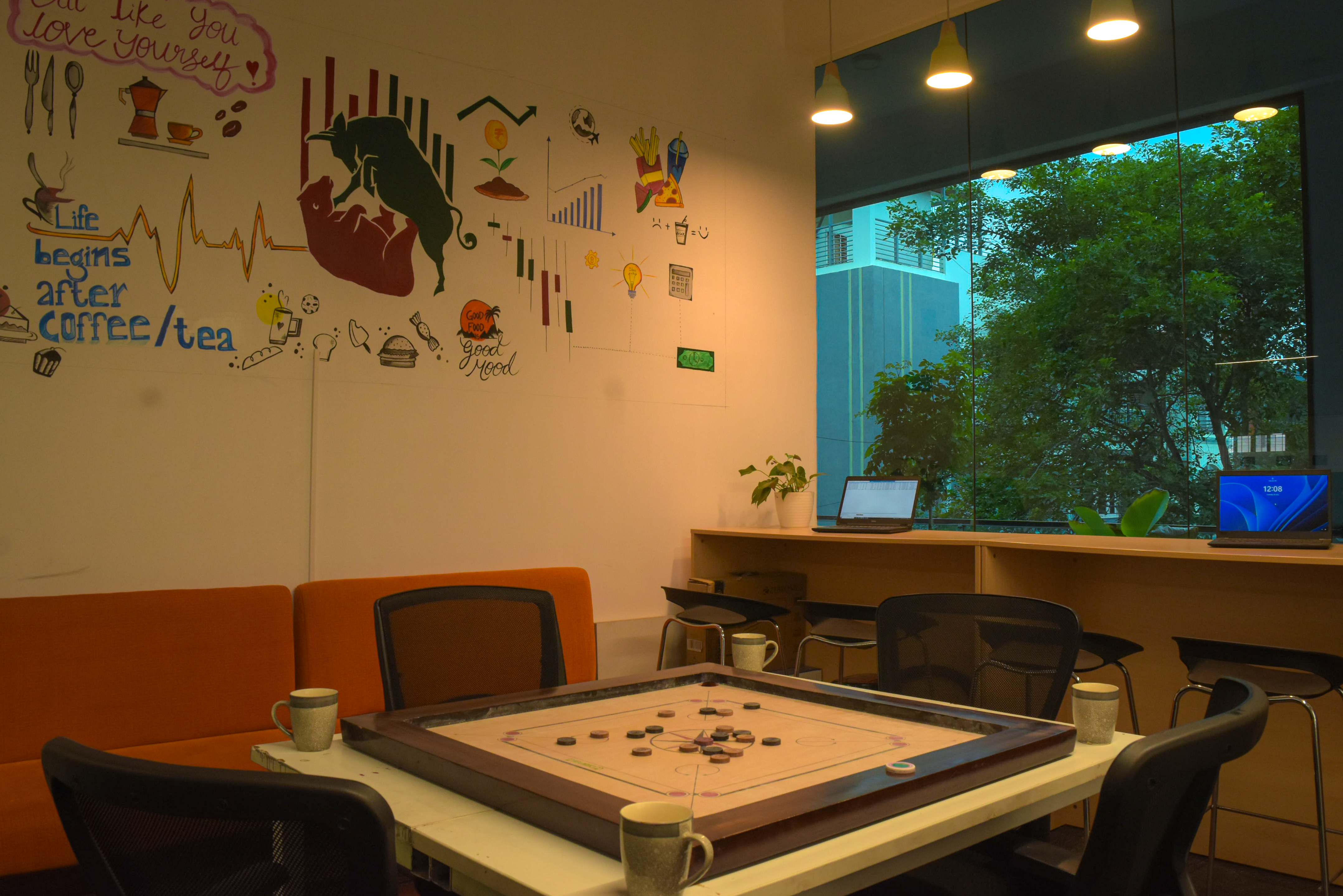 Traders and investors collaborating at Index Cafe